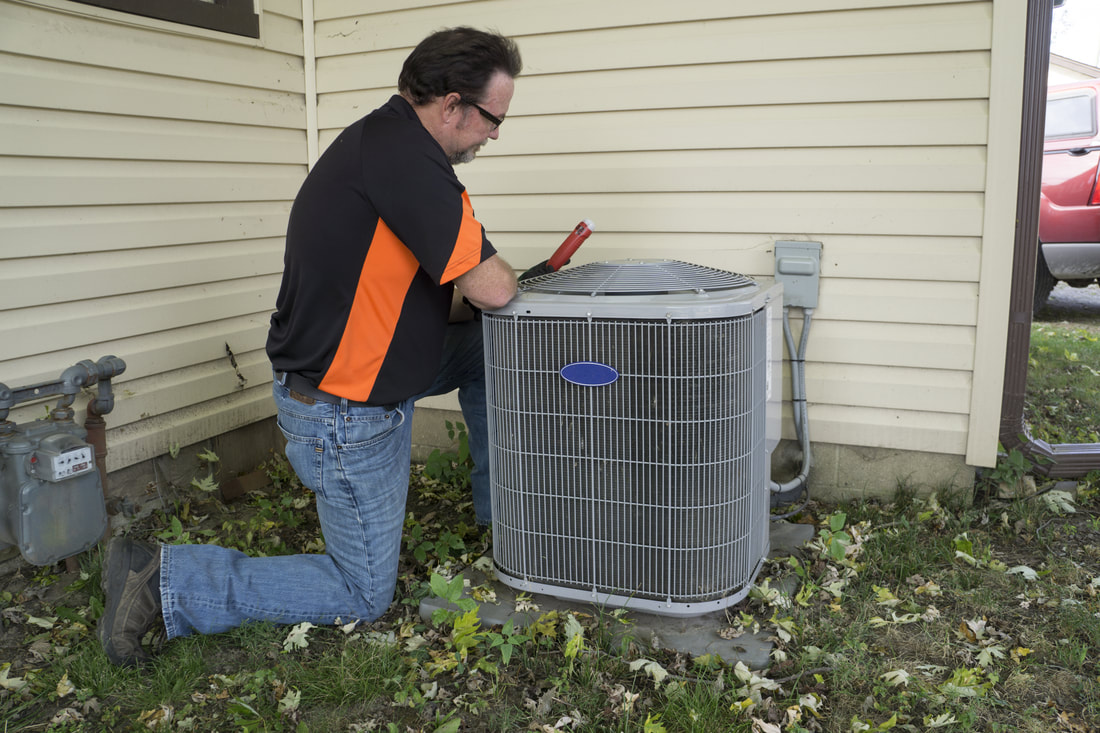 Picture of a hvac repairman. This photo was purchased from Adobe Stock. 